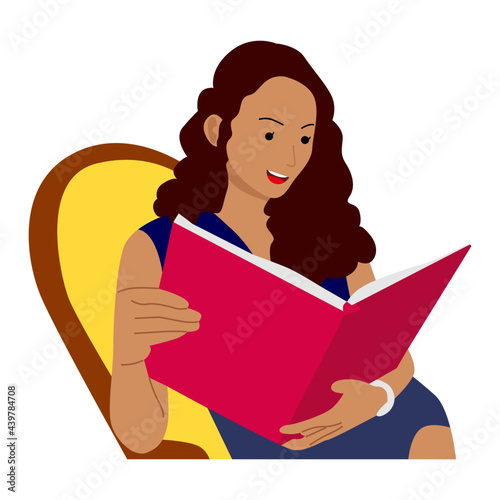 Woman sitting on sofa and read a book