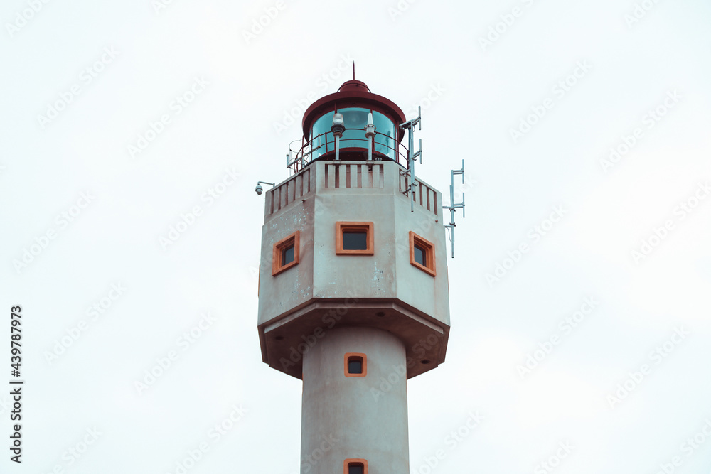 A lighthouse on a cloudy day A lighthouse on a cloudy day