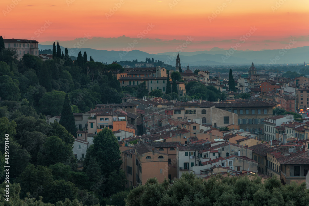 Florence, Italy -20 June, 2019 : panorama of the city at twilight, view from Piazzale Michelangelo residential area at picturesque hill, old historical buildings. 