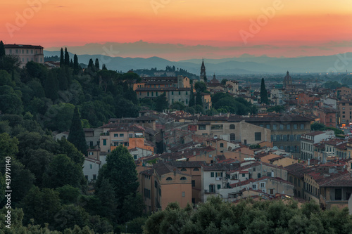 Florence, Italy -20 June, 2019 : panorama of the city at twilight, view from Piazzale Michelangelo residential area at picturesque hill, old historical buildings. 