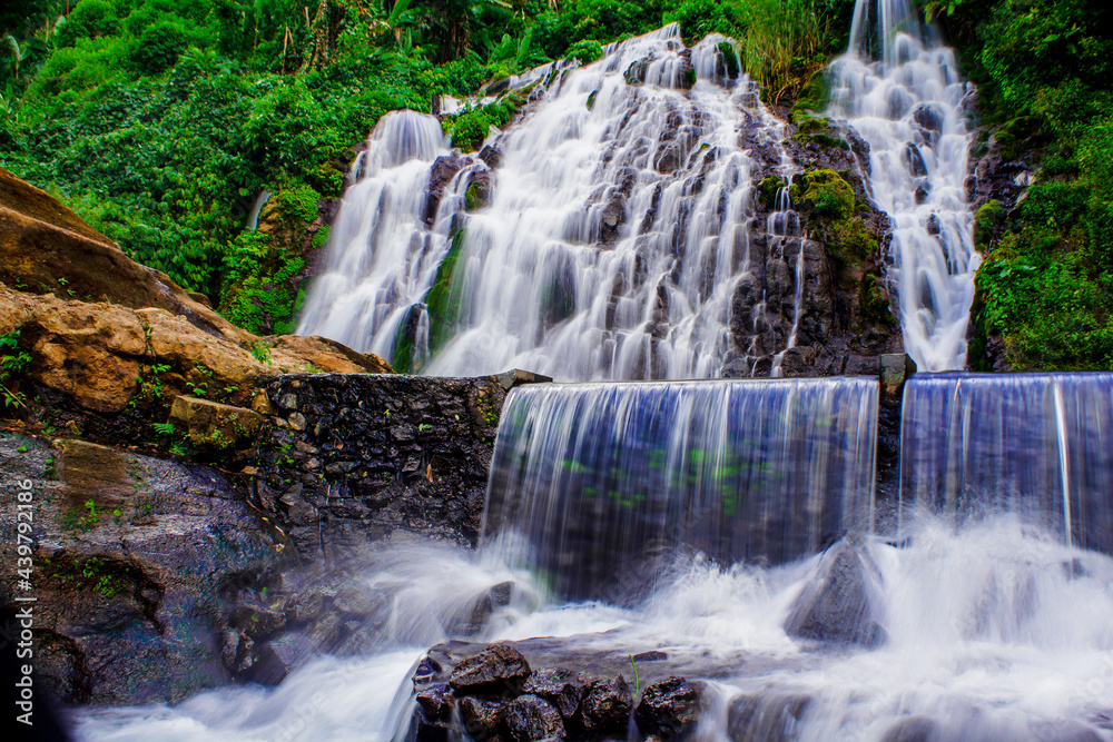 Fototapeta premium Beautiful view of Tirta Bhuwana waterfall in Bali