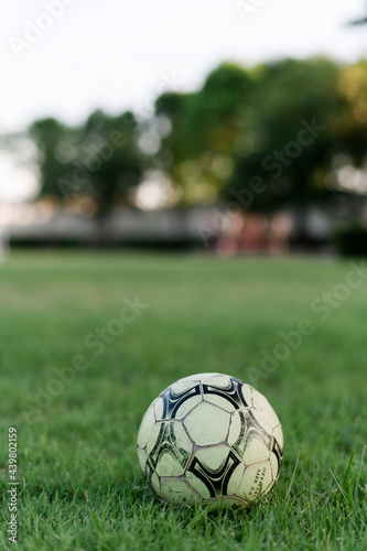 Small soccer field in the park Along with soccer balls and small goals for the children to play in the evening.