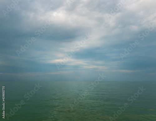 Emply ocean with bank of clouds © Thitiwut