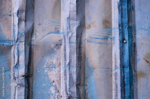 Texture from blue and white zinc wall. © AmazonAnnH1565