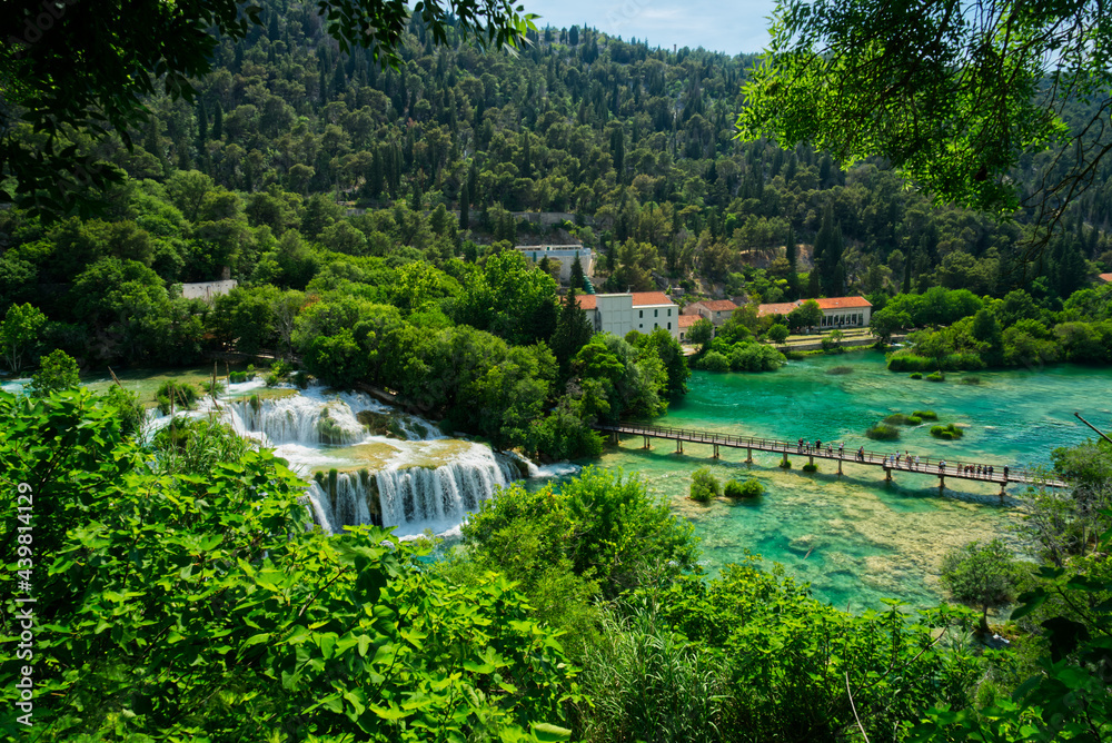 Waterfall and historical village in Krka National Park in Croatia, Europe, HDR