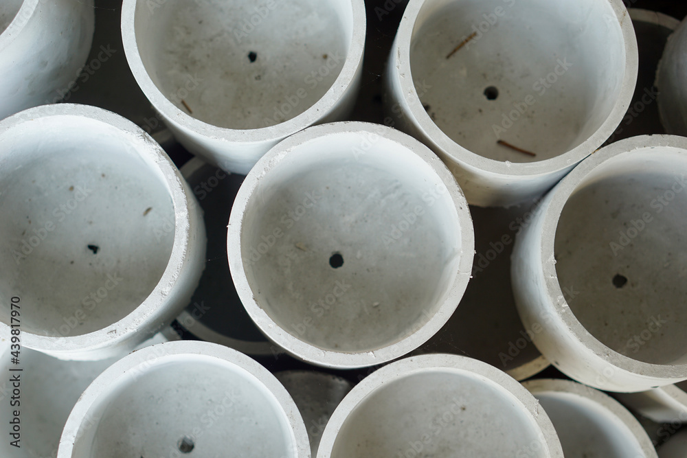 High angle view of white ceramic pots for ornamental plants, cacti, and succulents High angle view of white ceramic pots for ornamental plants, cacti, and succulents