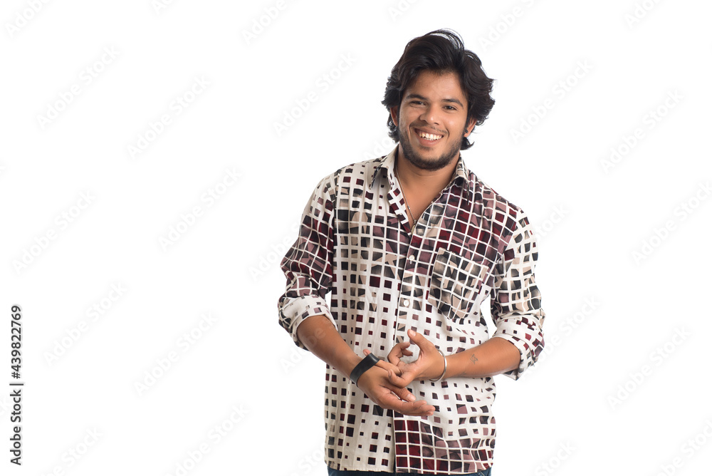 Young man posing on a white background Young man posing on a white background