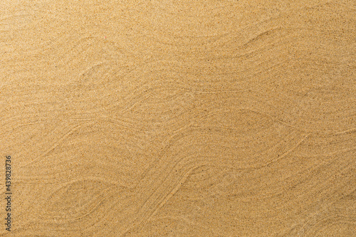 The texture of the smooth surface of fine-grained sand