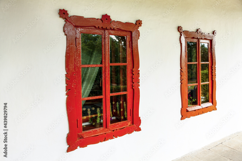Obraz premium Exterior with of wooden windows in vintage style . White walls with windows