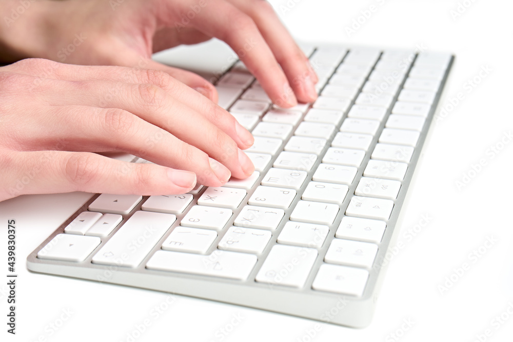 White wireless computer keyboard isolated. Russian-English keyboard layout White wireless computer keyboard isolated. Russian-English keyboard layout