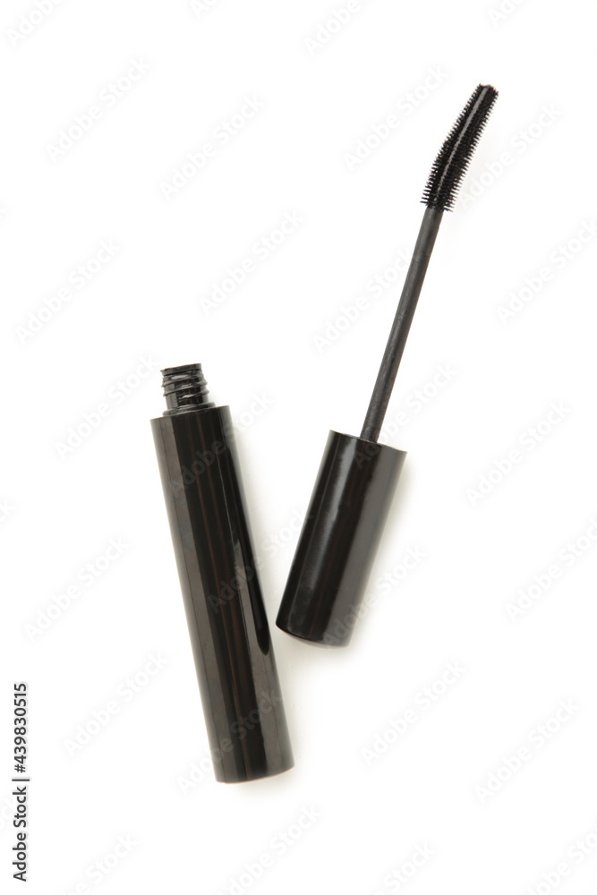 Black mascara wand and tube isolated on white background Black mascara wand and tube isolated on white background