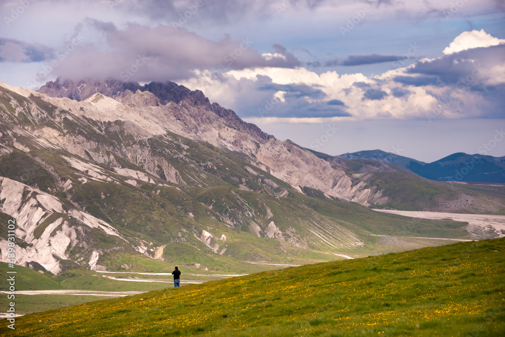 Natural landscape with a hiker in mountains