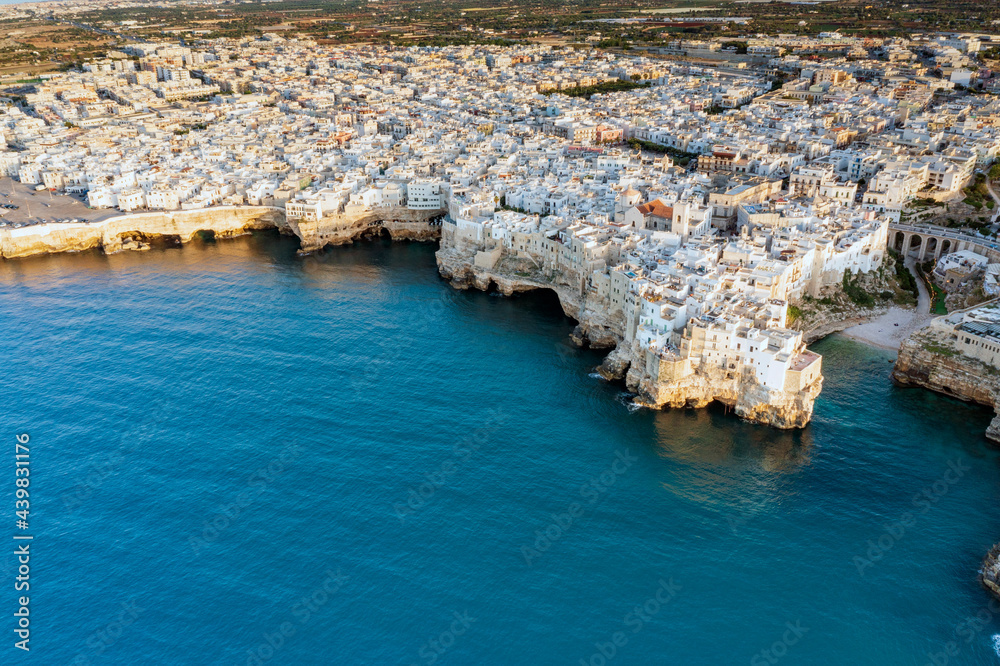 Aerial view of a sunset of Polignano by sea in Bari. A village by the sea in Puglia. Wonderful landscape