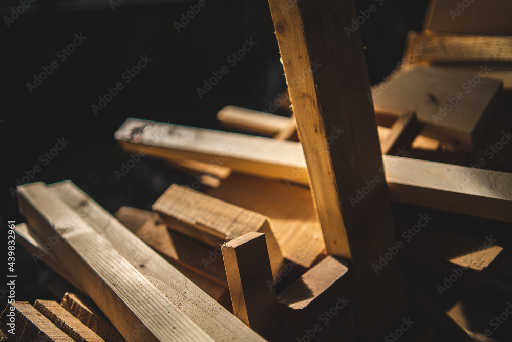 Background image of furniture woodworking workshop, carpenters industrial wooden material work table with different craft tools and wood cutting stand, vintage filter image.