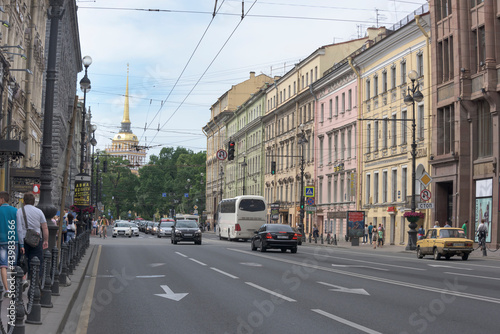  Nevsky Avenue with moving on it pedestrians and cars © Aleksandr