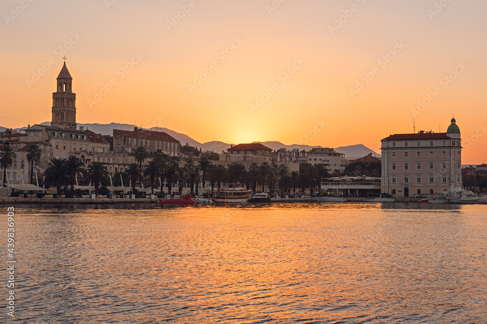 Scenic view of the embankment of Split old city and Diocletian’s palace at sunrise, beautiful cityscape, outdoor travel background, Dalmatia, Croatia. Famous tourist destination in Europe