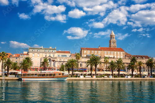 Scenic view of Split old city, embankment, ancient architecture and famous Diocletian’s palace, beautiful cityscape with blue sky and sea, Dalmatia, Croatia, outdoor travel background