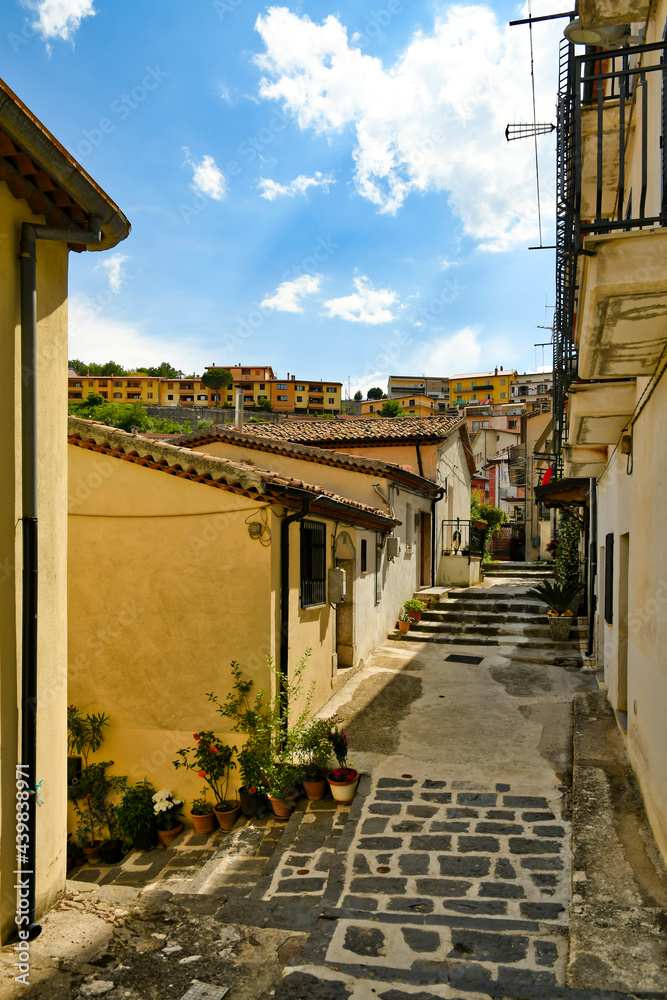 Muro Lucano, Italy, June 12, 2021. A narrow street among the old houses of a medieval village in the Basilicata region.