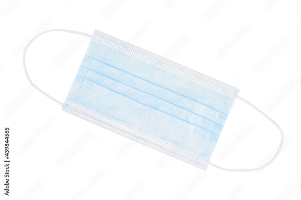 Surgical or medical mask with rubber ear straps. Typical 3-ply doctor mask to cover the mouth and nose. Procedure mask from bacteria. Protection concept. Surgical or medical mask with rubber ear straps. Typical 3-ply doctor mask to cover the mouth and nose. Procedure mask from bacteria. Protection concept.