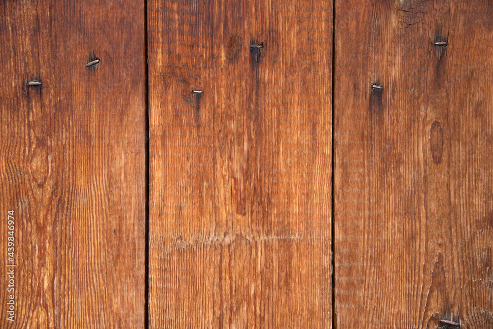 bright brown wooden fence with old nails bright brown wooden fence with old nails