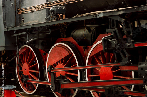 Old vintage black and red wheels steam locomotive