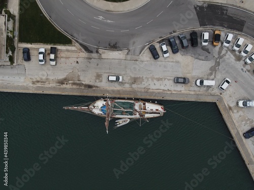 Aerial View Old Wooden Antique Pirate Ship With British, United kingdom Of Great Britain And Northern Ireland Flag In Port Of Igoumenitsa. 