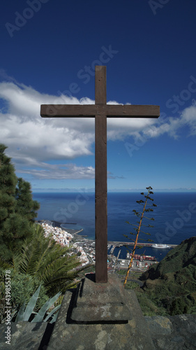 Cross on the hill, above the picturesque harbor, La Palma, Canary islands