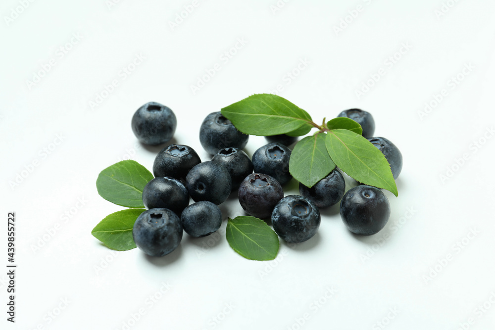 Fresh blueberry with leaves on white background Fresh blueberry with leaves on white background