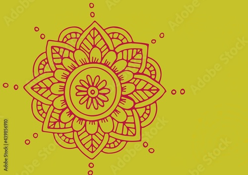 Digitally generated image of decorative floral design against yellow background