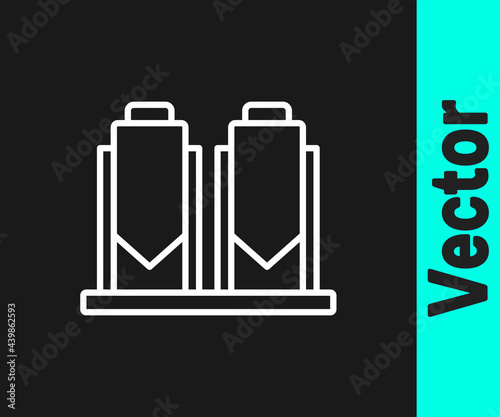 White line Traditional brewing vessels in brewery icon isolated on black background. Beer brewing process. Distillery plant, brewery. Vector