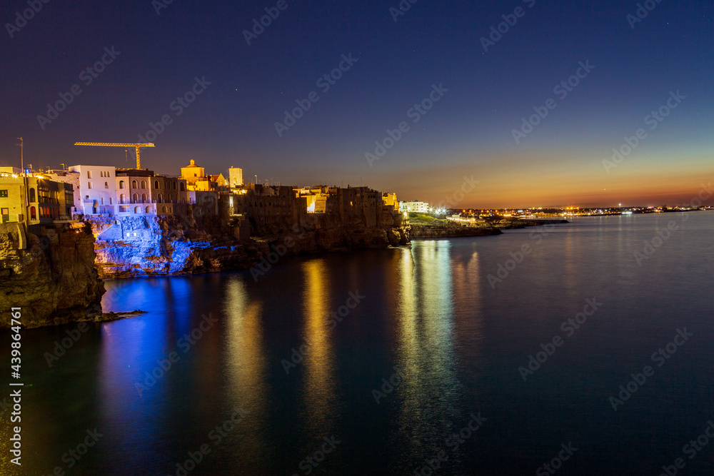 Polignano at sea at night, Immediately after sunset, a village by the sea in Bari in Puglia