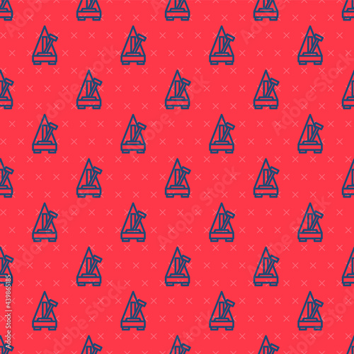 Blue line Classic Metronome with pendulum in motion icon isolated seamless pattern on red background. Equipment of music and beat mechanism. Vector