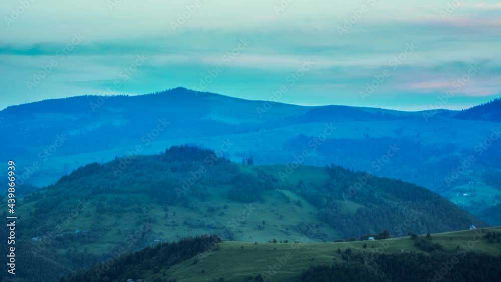 time lapse of sunset sunrise in mountain hills with clouds time lapse of sunset sunrise in mountain hills with clouds