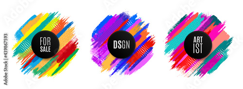 Original circular emblem by paint brush, colorful background.