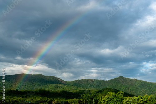 landscape of view Rice fields, mountains and rainbows in the countryside of Thailand