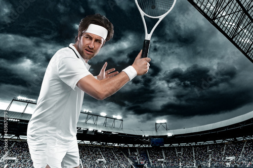 Tennis player with racket in white costume. Man athlete playing isolated on light background. © Mike Orlov