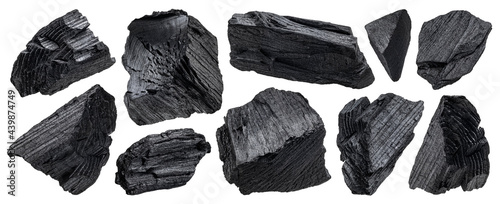 Natural wood charcoal isolated on white background photo