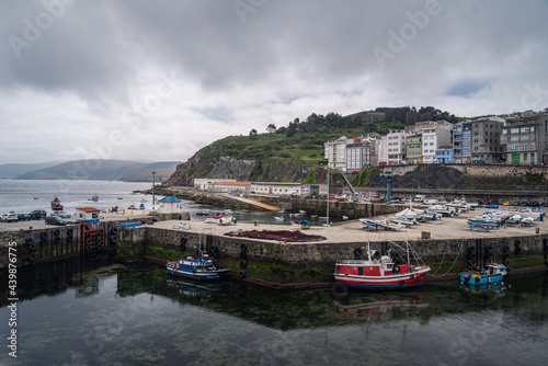 Beautiful seaport filled of fishing boats in Malpica Galicia Spain photo