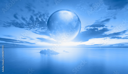 Full glass moon (or crystal ball moon) rising over empty sea with night 
