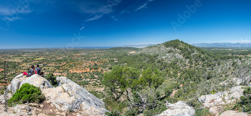 hikers at the top, Puig de Ses Bruixes and Puig den Claret, Llucmajor, Mallorca, Balearic Islands, Spain