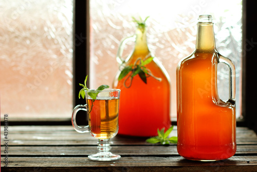Glass bottles of fermented kombucha tea
