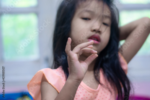 A 5-year-old Asian girl broke her first tooth.