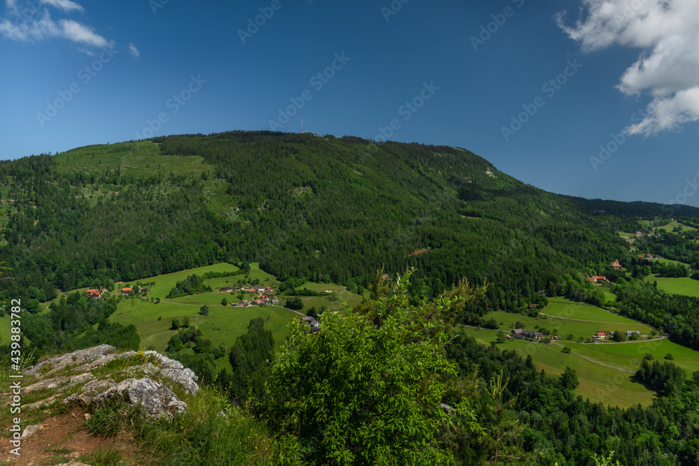Schockl hill and Ehrenfels castle near Sankt Radegund town in summer morning