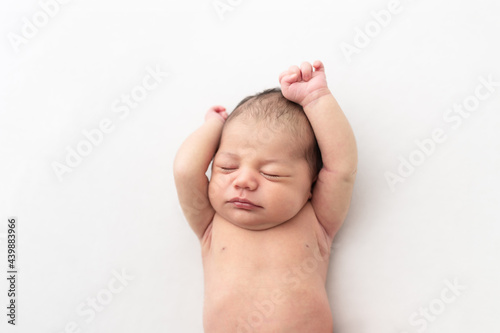 Baby stretching awake