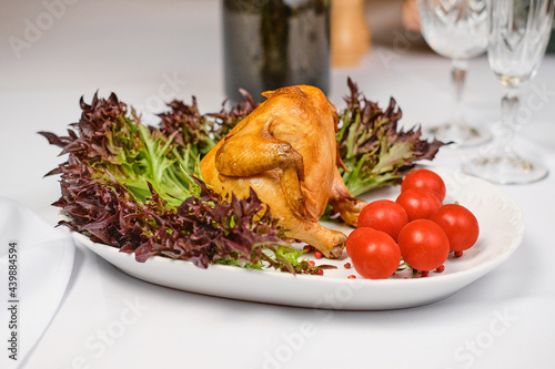 Fried chick with tomatoes. Food meat. 