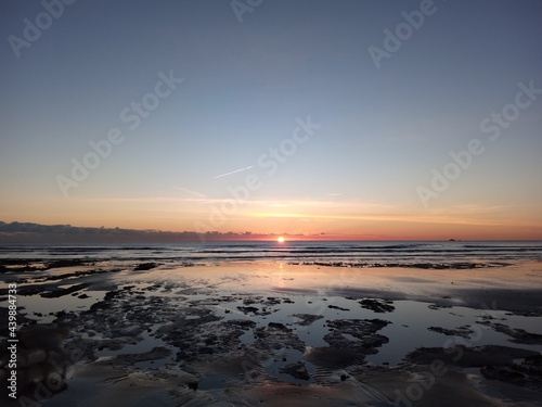Sunrise on beach © Robin