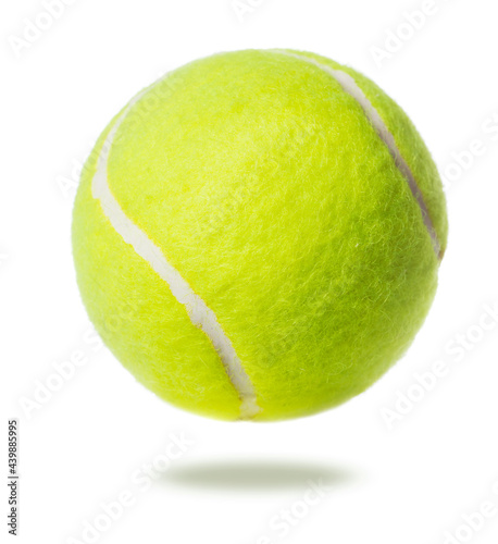 single green tennis ball isolated on white background © Pineapple studio
