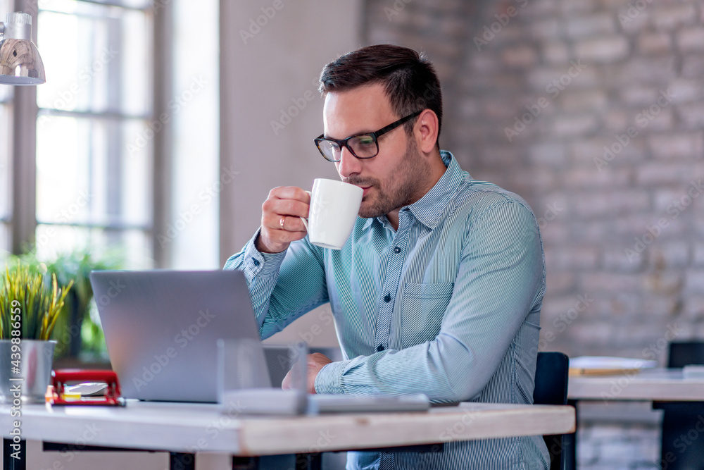 Young businessman in office Young businessman in office