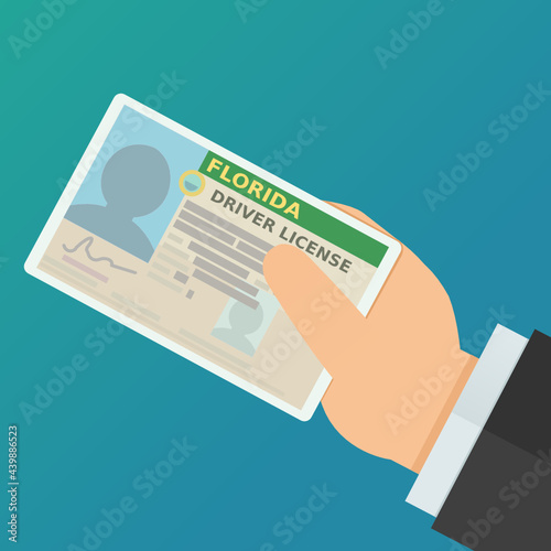 A hand presents a Florida driver's license on a blue background (flat design)