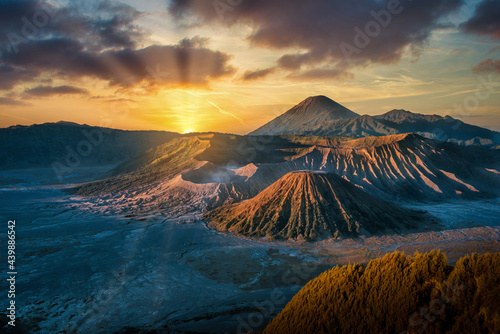 Mount Bromo volcano (Gunung Bromo) at sunrise with colorful sky background in Bromo Tengger Semeru National Park, East Java, Indonesia. photo